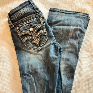 Rock Revival Women’s Mid Wash Bootcut Jeans with Embellished Pockets